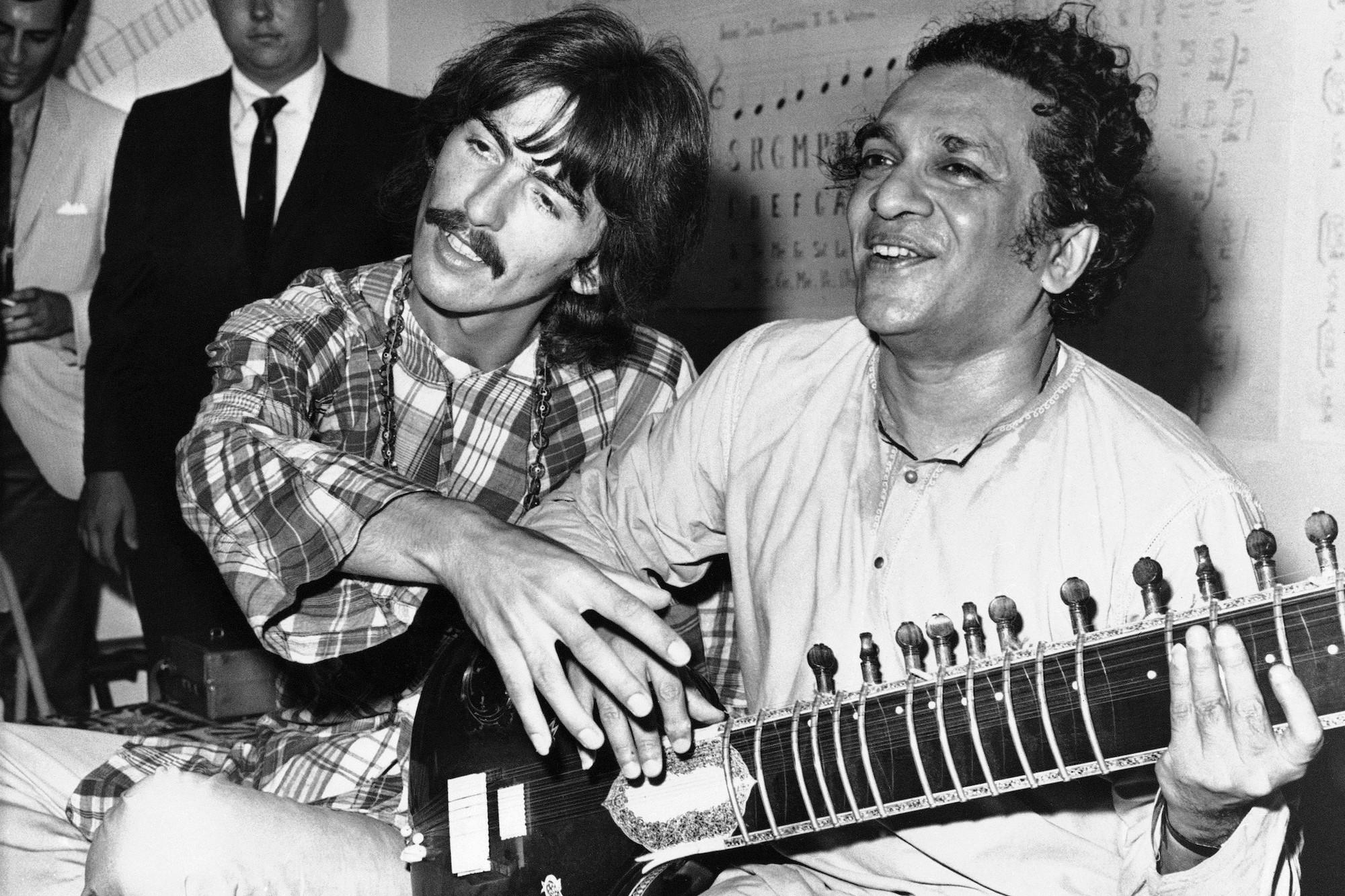 George Harrison and his musical mentor Ravi Shankar in 1967AP